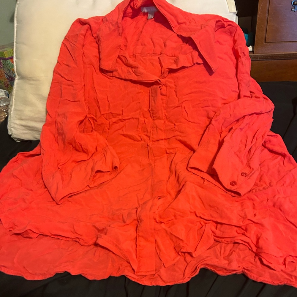 Woman Within Bold Red Blouse